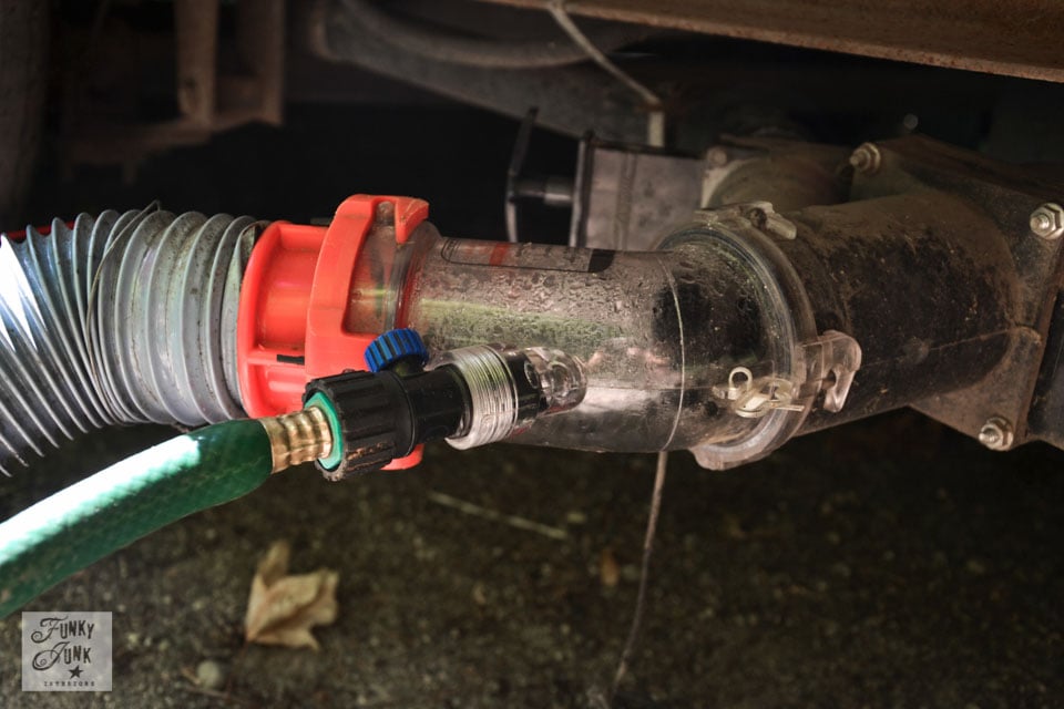 Tips for camping in a travel trailer - why a clear sewer hose adaptor is the bomb! / funkyjunkinteriors.net