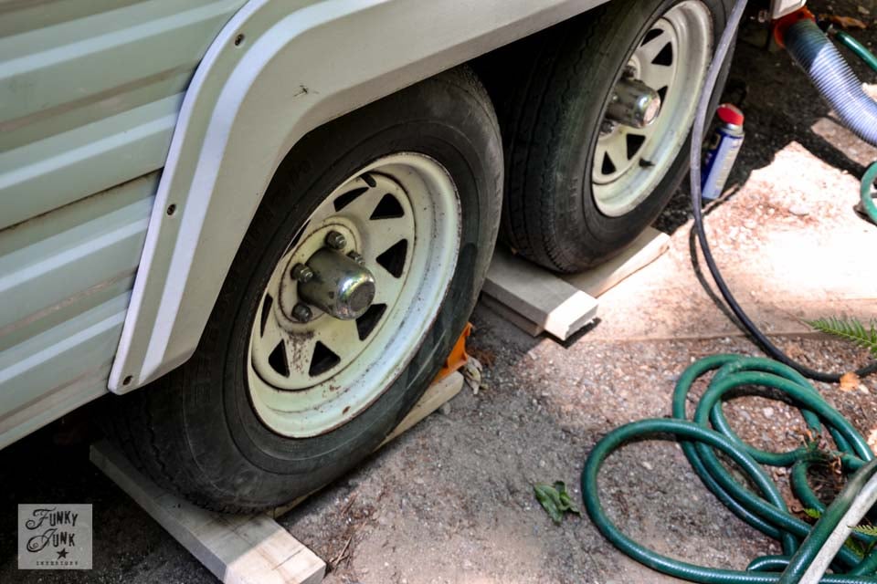 Tips for camping in a travel trailer - how to level trailer tires / funkyjunkinteriors.net
