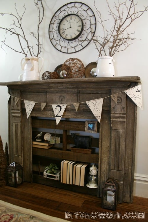 Faux fire place with pallet shelving by DIY Showoff