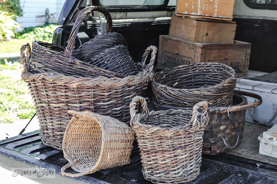 Rustic baskets with hooks - When a junker's junker brother has a garage sale, via Funky Junk Interiors