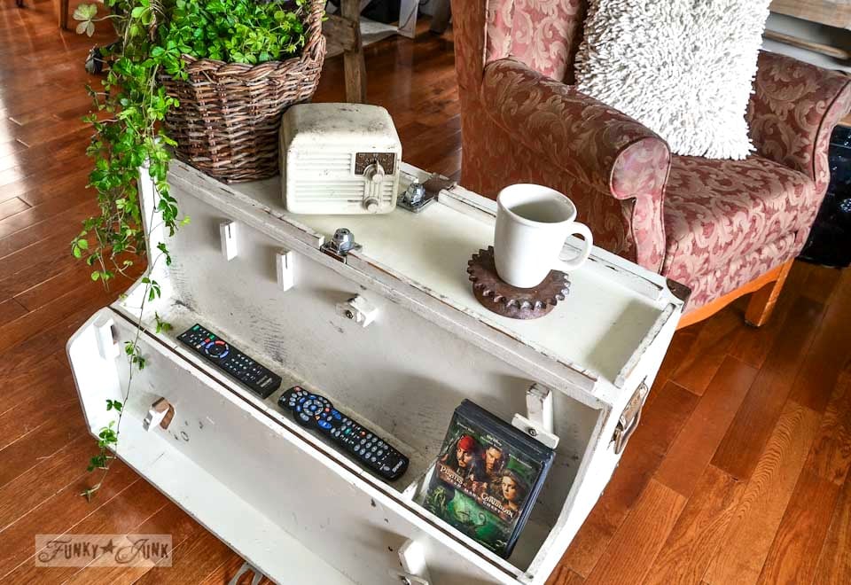 A funky tool box side table with hidden junk storage