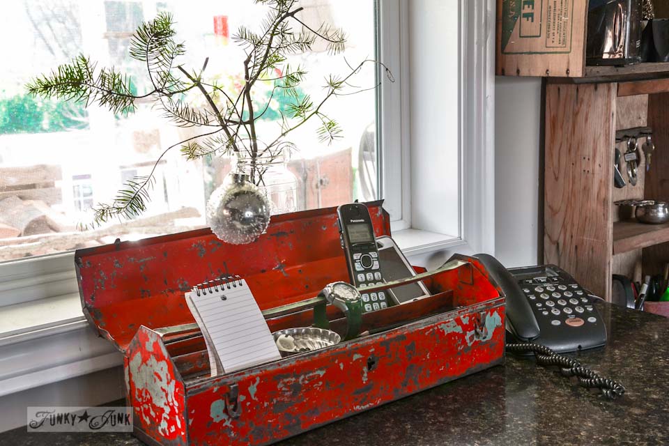 Red toolbox charging station / A well lit junky Christmas kitchen / salvaged finds used to deck out this kitchen for Christmas via https://www.funkyjunkinteriors.net/ Red toolbox charging station / A well lit junky Christmas kitchen / salvaged finds used to deck out this kitchen for Christmas via https://www.funkyjunkinteriors.net/