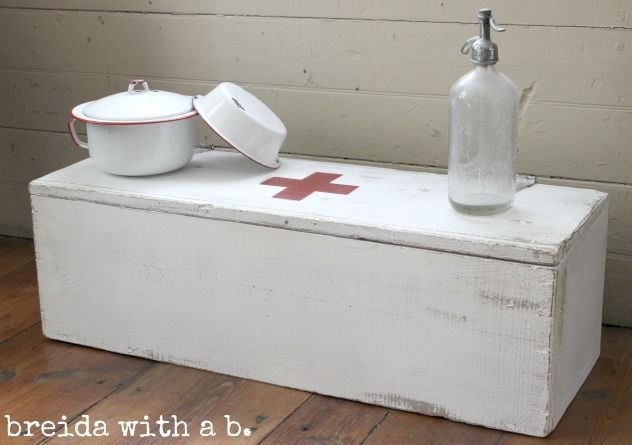 Red cross white box by Breida with a B