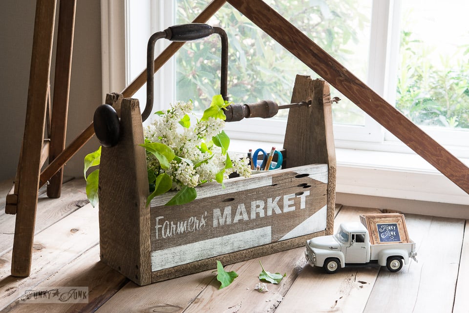 A reclaimed wood drill handled toolbox of many talents