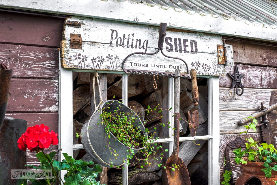 Rustic shed reveal with sawhorse potting bench and old 