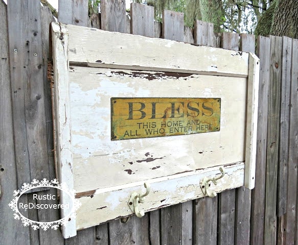 Repurposed door coat hook hanger with sign, by Rustic Rediscovered, featured on Funky Junk Interiors