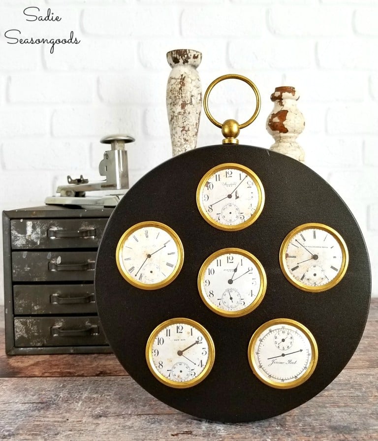 Faux clocks in a picture frame by Sadie Seasongoods, featured on Funky Junk Interiors