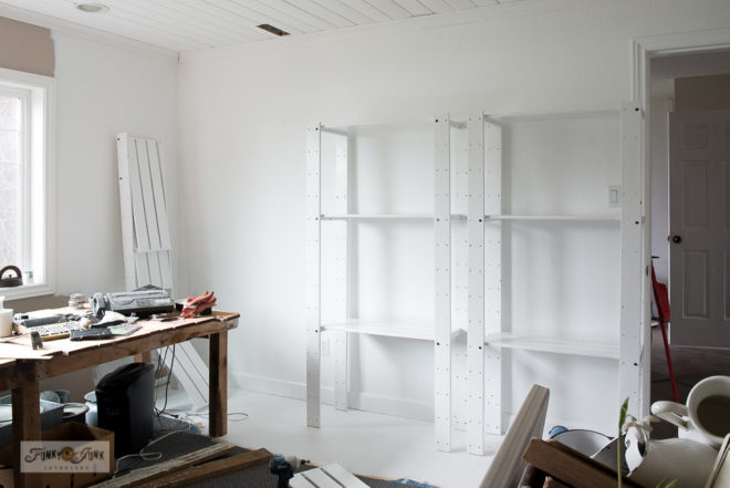 Collection storage on white painted shelving - Funky Junk ...