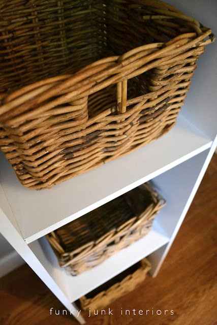 How to build an easy clothes closet from a $50 kit! Ikea basket storage in cubbies. | funkyjunkinteriors.net