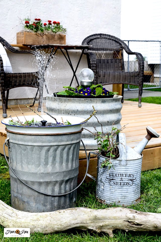 solar water fountain galvanized garden sitting area