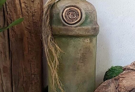 faux clay glass bottle