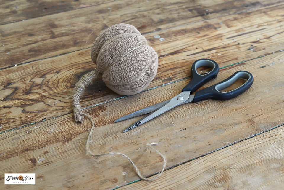 creating a pumpkin stem from twine on a fabric pumpkin