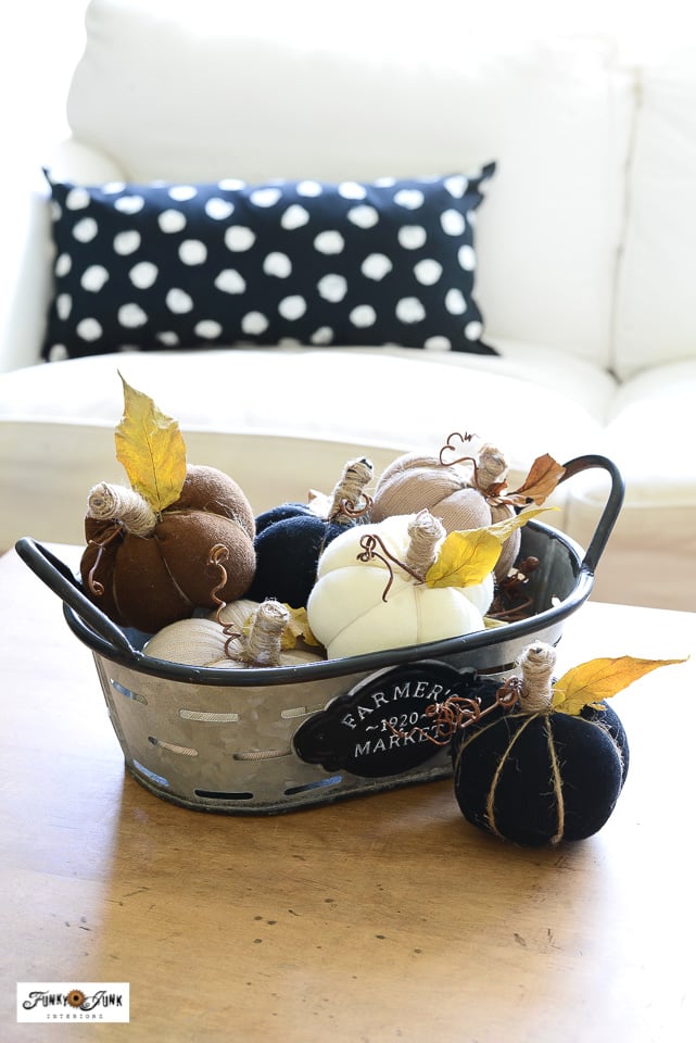 sock pumpkins in galvanized basket