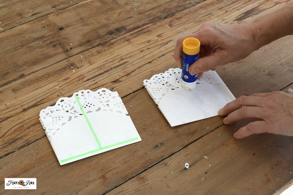 make paper snowflakes from doilies