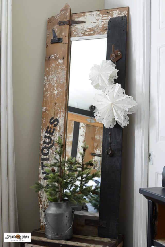paper doily snowflakes hanging on display