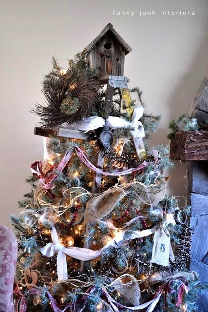 Rustic Christmas tree with a stepladder underneath