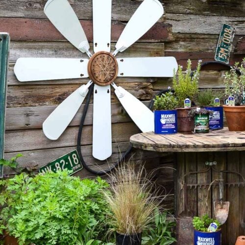 upcycled ceiling fan blade flower yard art