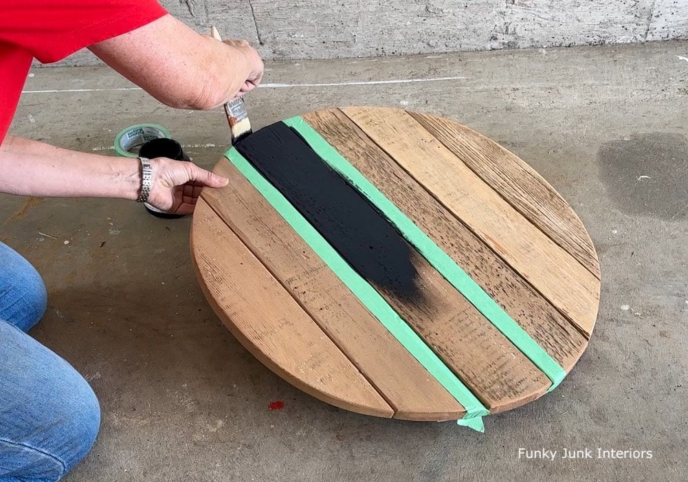 painting a wood round with a black stripe for a tire ottoman
