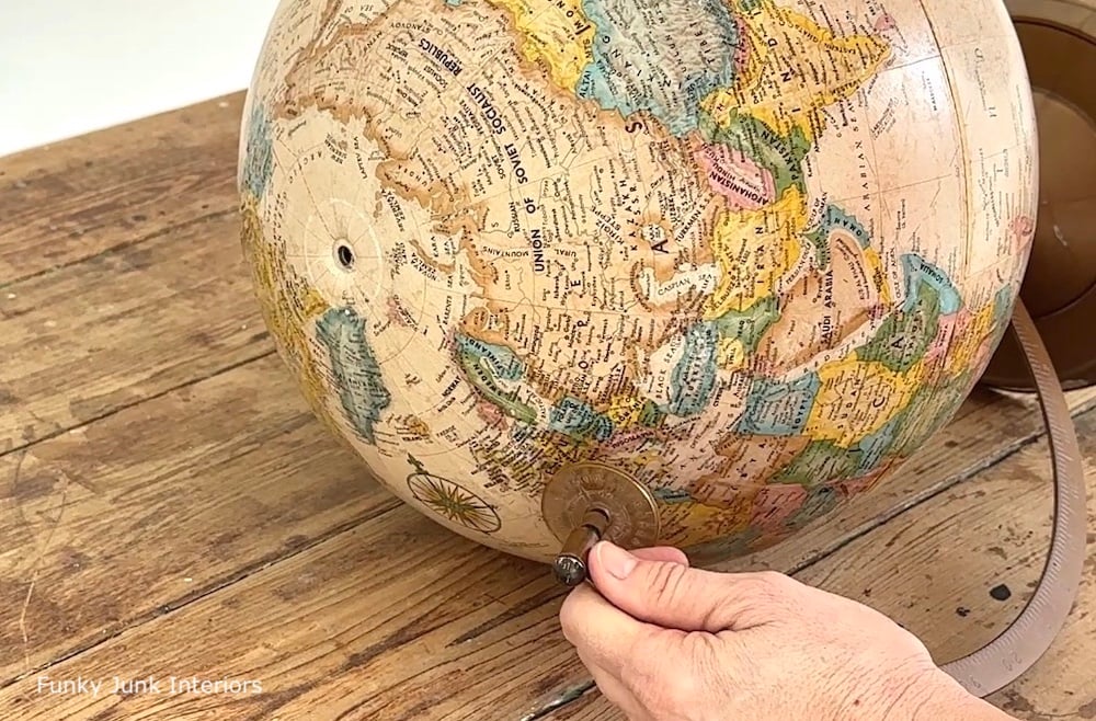 taking apart an upcycled globe