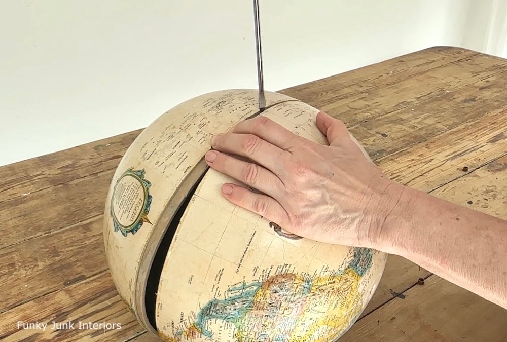 taking apart an upcycled globe