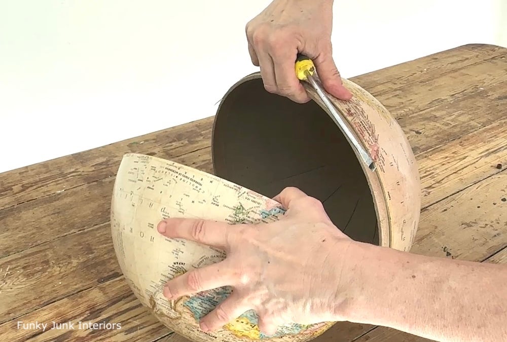 taking apart an upcycled globe