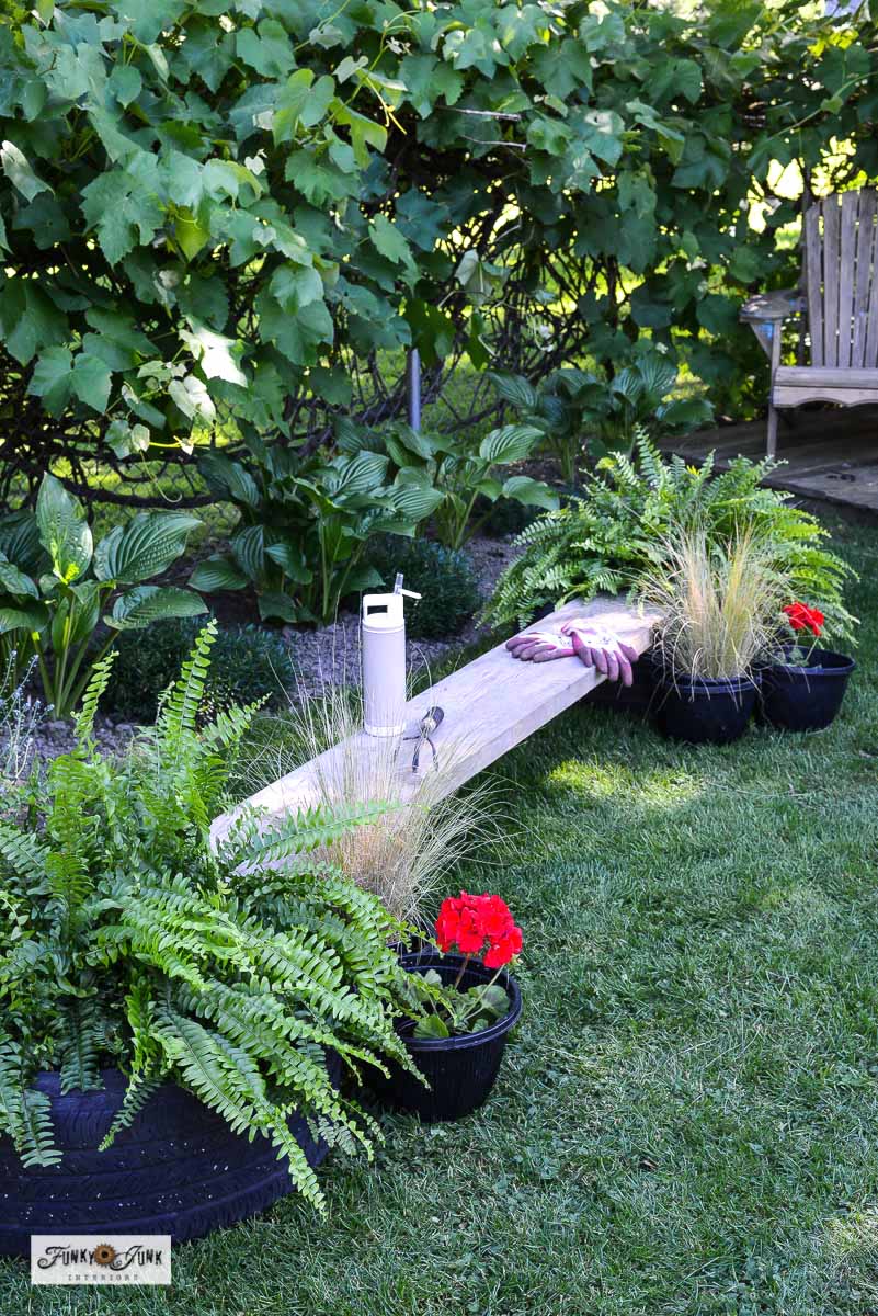 things made with used tires - upcycled tire bench with flower planters
