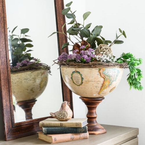 upcycled globe pedestal bowl filled with plants