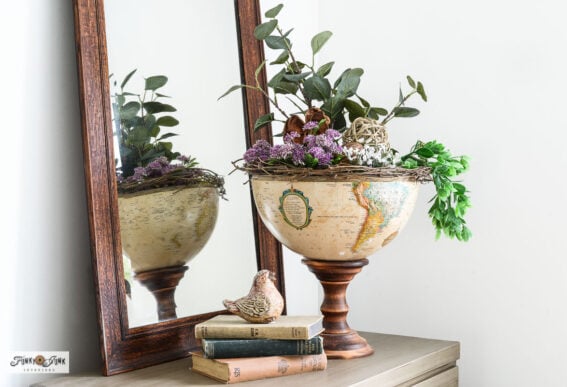 upcycled globe pedestal bowl filled with plants