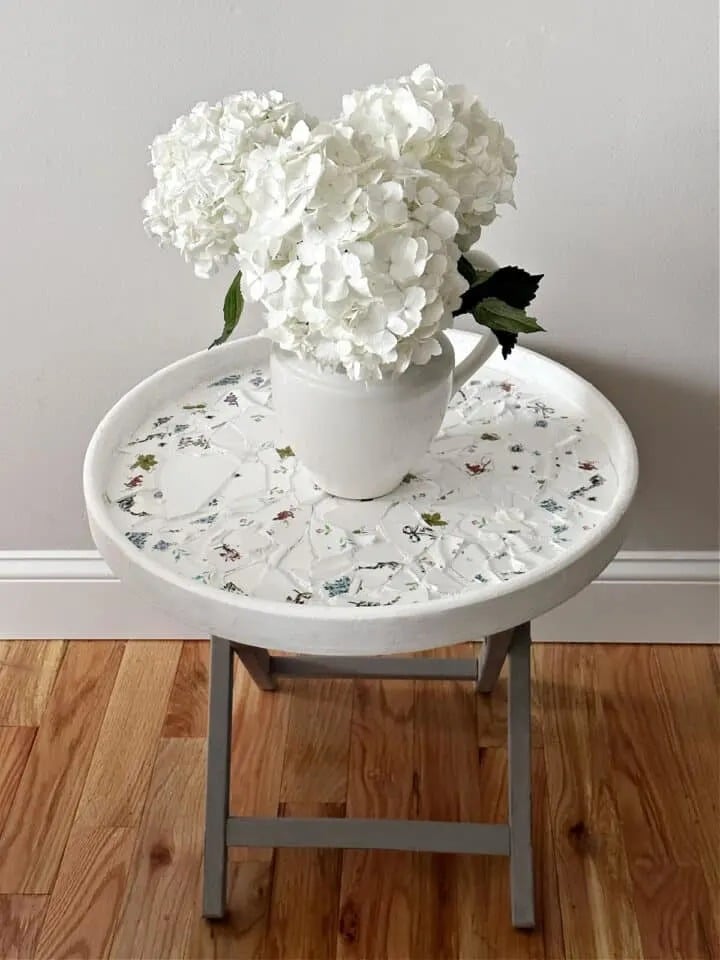 Broken plate mosaic table by Our Crafty Mom featured on New Upcycle Ideas 837