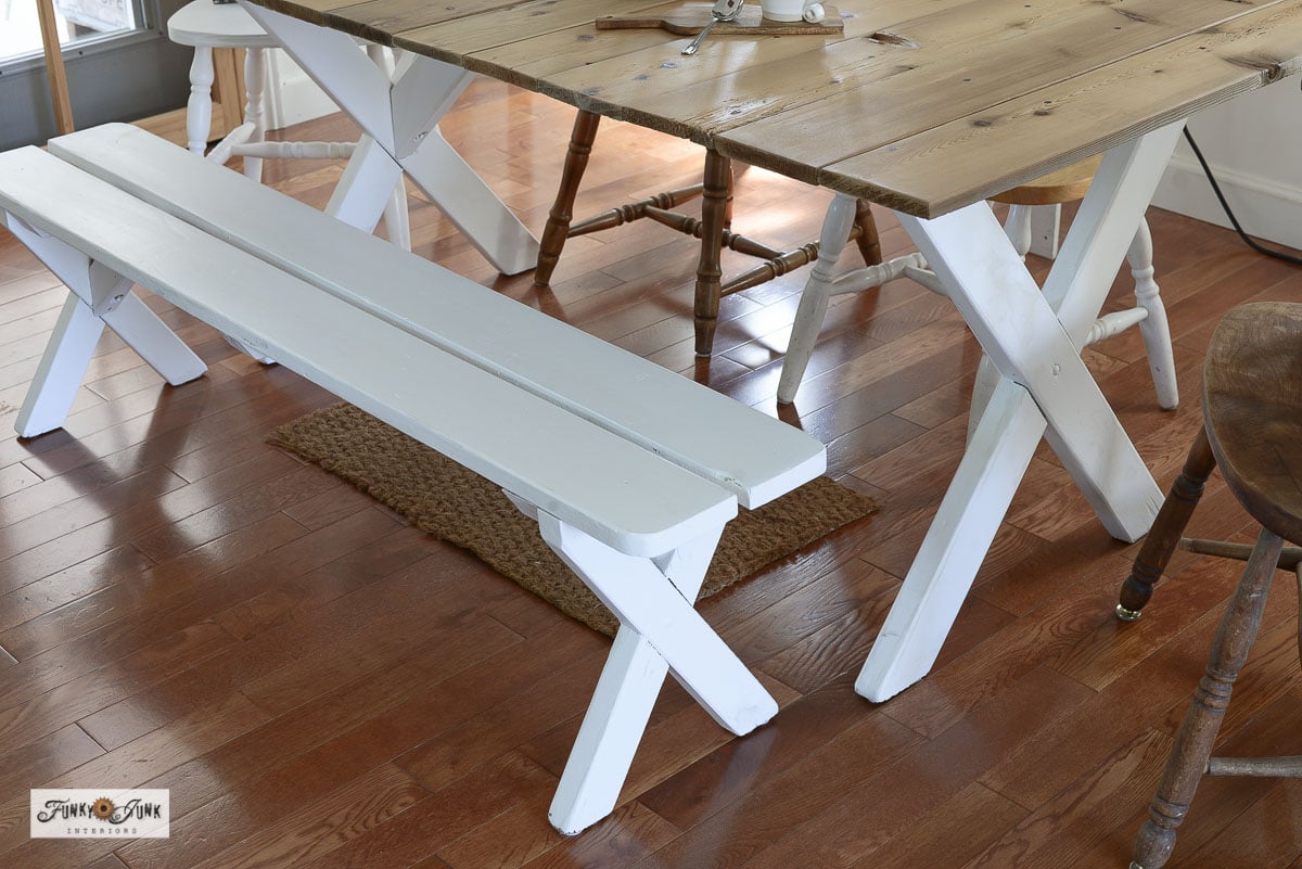 armhouse dining table with a white painted bench