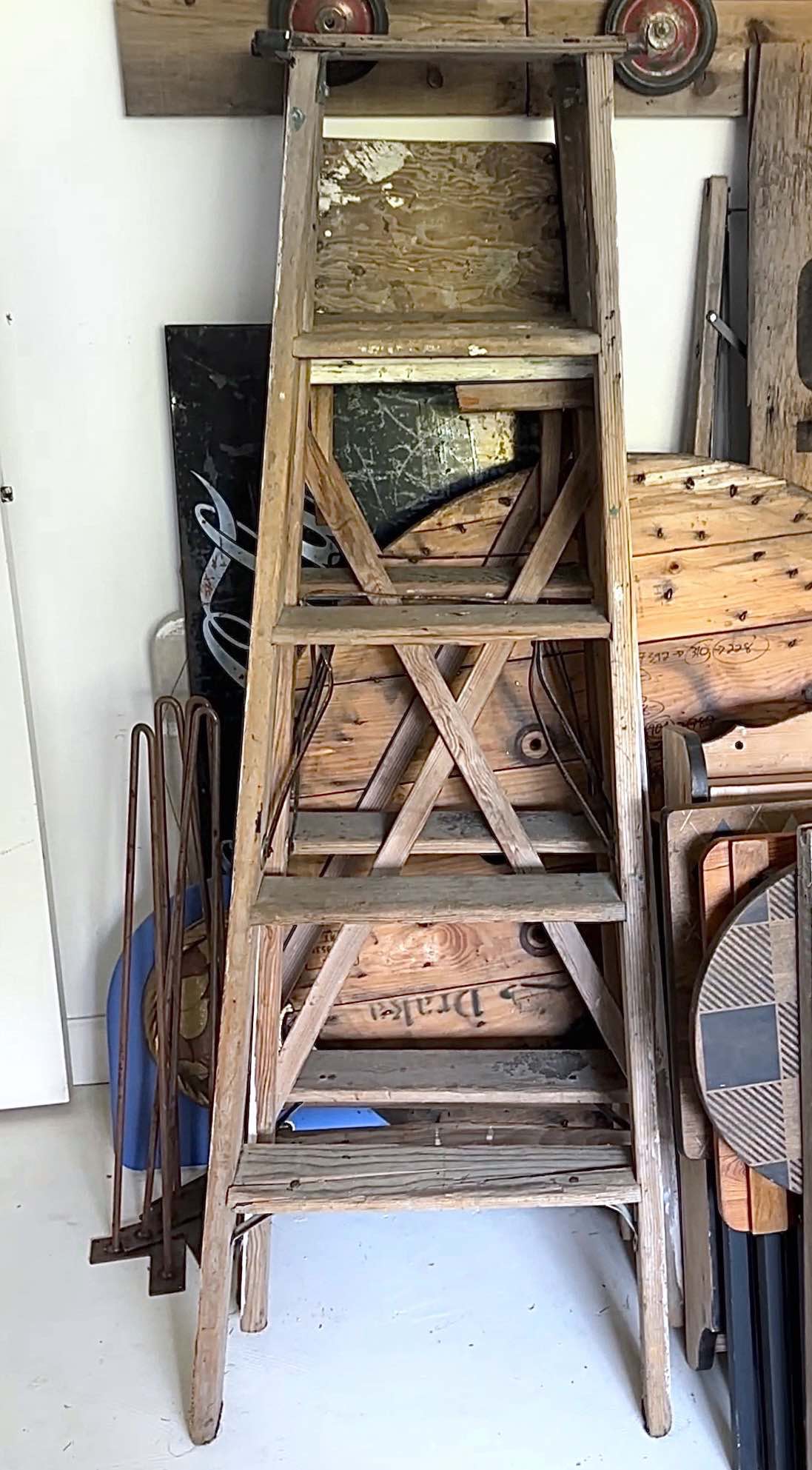 aframe ladder to become a garden arbor
