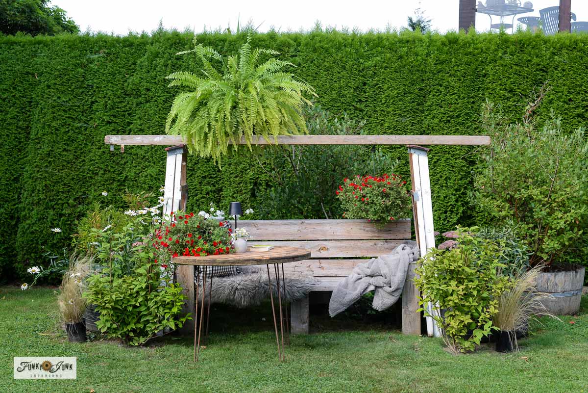 easy diy garden arbor made with 3 ladders, bench and cable reel table
