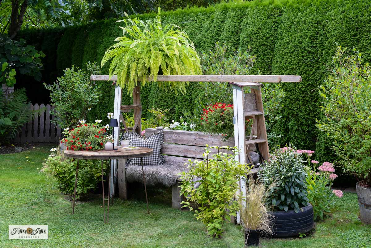 easy garden arbor made with ladders and bench