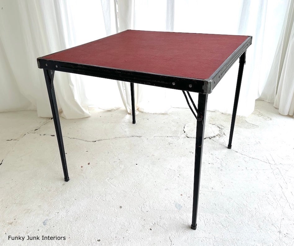 black and red card table before