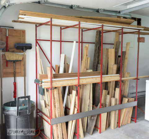 metal rack full of reclaimed wood