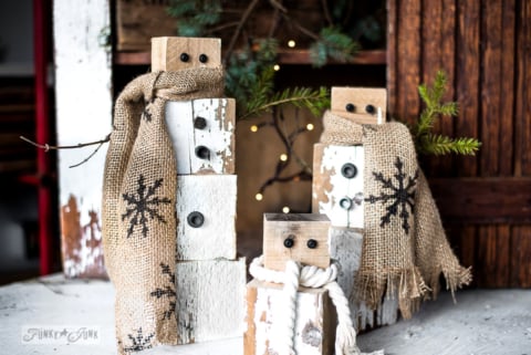 scrap wood rusty junk snowmen with rope and burlap scarves-001