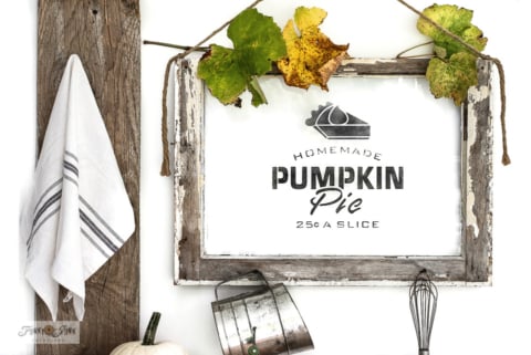 Homemade Pumpkin Pie sign on an old window with stencils