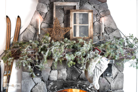 Rustic evergreen branches with windows Christmas fireplace mantel in Christmas livingroom home tour-003