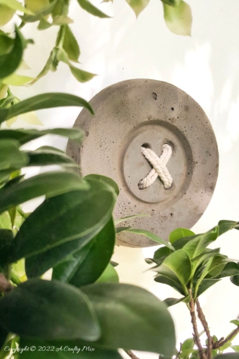 DIY concrete button garden art