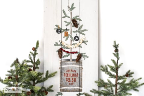 how to draw a Christmas tree in a pot with decorations