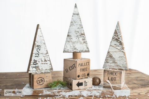 white chippy decorated Christmas trees with crate skirts