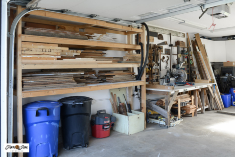 garage shelving stocked with wood