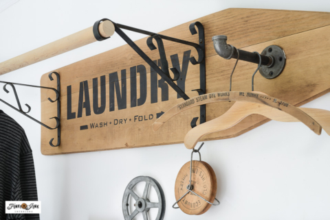vintage ironing board drying rack for a laundry room