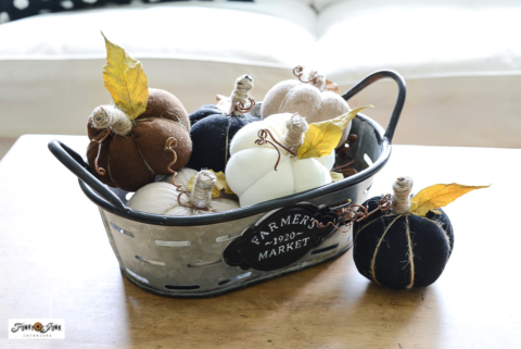 sock pumpkins in galvanized basket